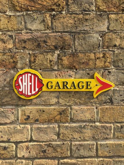 Shell garage arrow sign